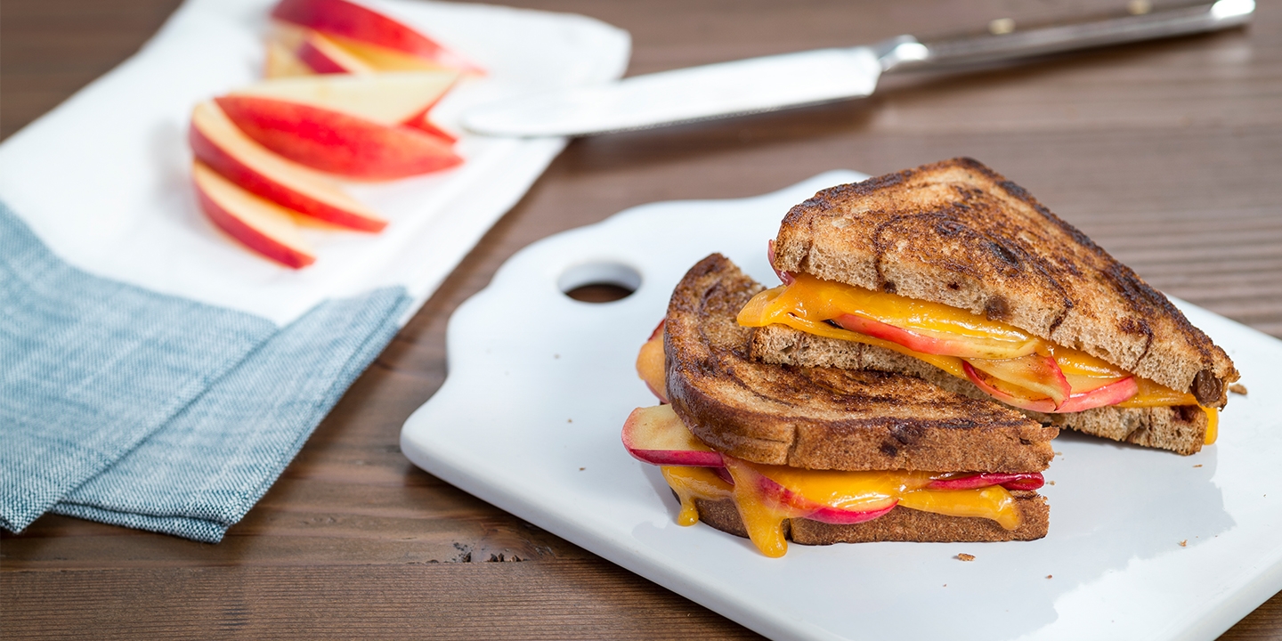 Apple Pie Gilled Cheese Sandwich served on a white board