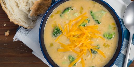 Broccoli and Leek Soup topped with cheese