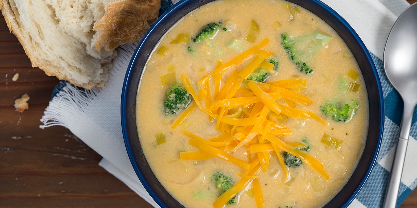 Broccoli and Leek Soup topped with cheese