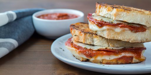 Pizza Cheese Sandwich served on a plate