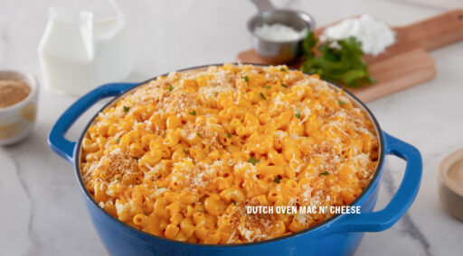 Mac & Cheese served in a big blue cast iron pot