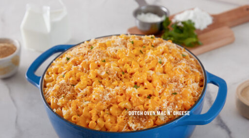 Mac & Cheese served in a big blue cast iron pot