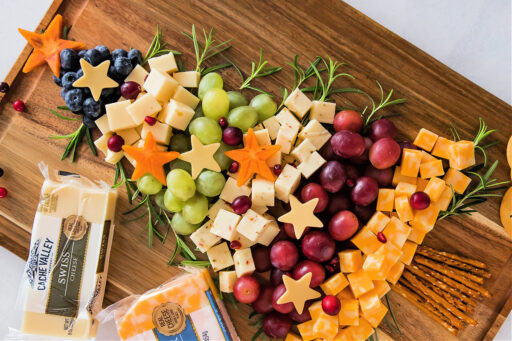 a snack board shaped like a Christmas tree