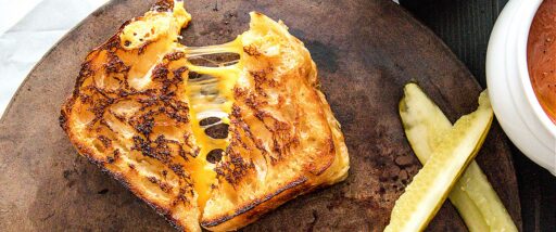 close up of a freshly cooked melty ultimate grilled cheese sandwich